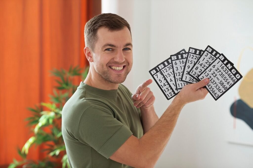 medium shot man holding bingo cards 23 2149193884